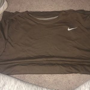 Brown Nike shirt